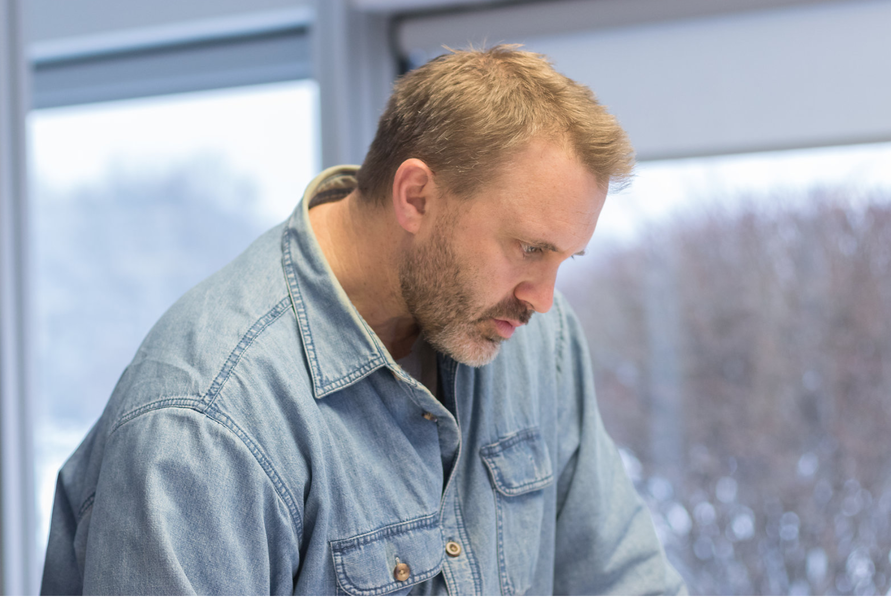 Man looking at notes