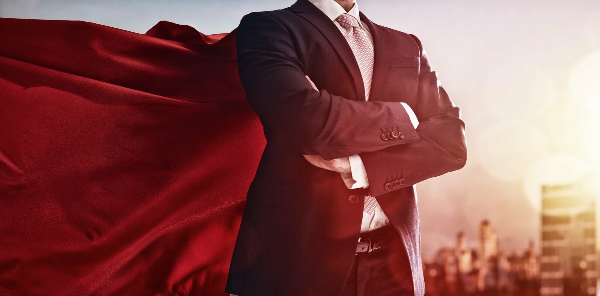 Business man in superhero cape