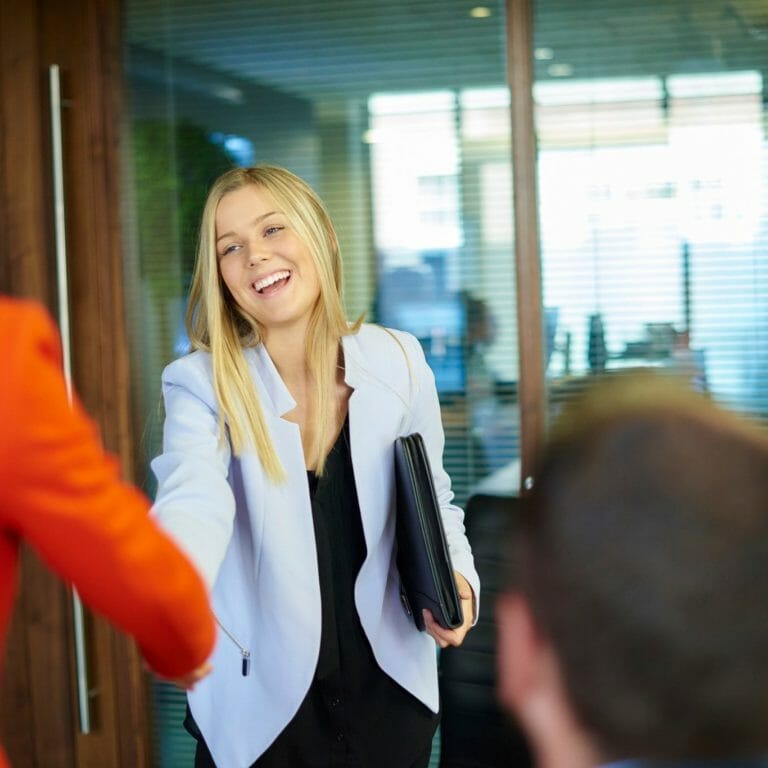 Woman walking into interview