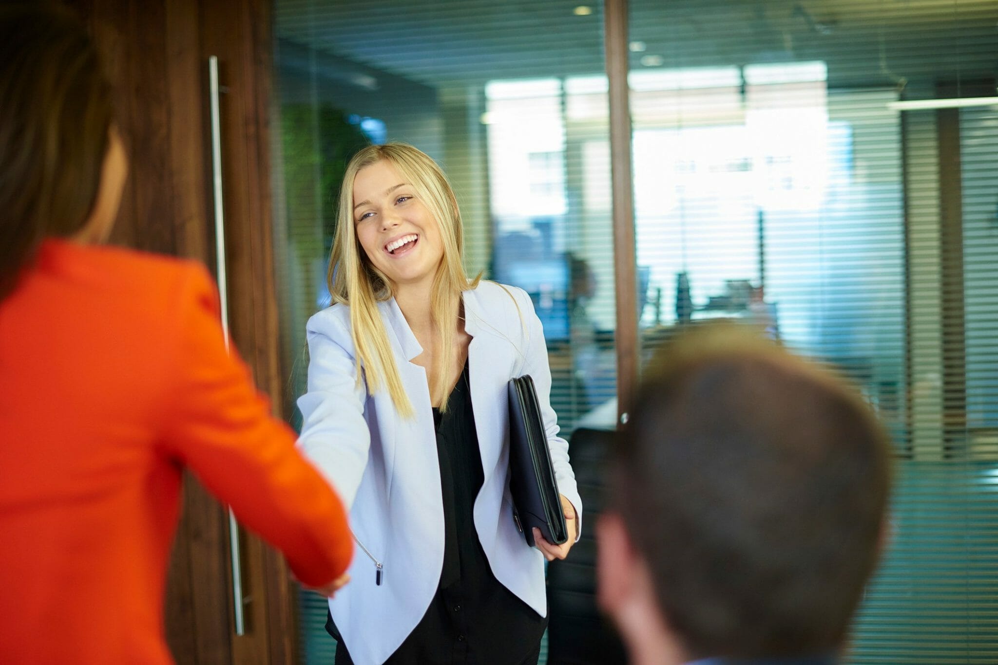 Woman walking into interview