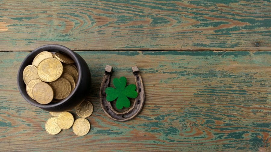 Gold coins, horse, and four leaf clover