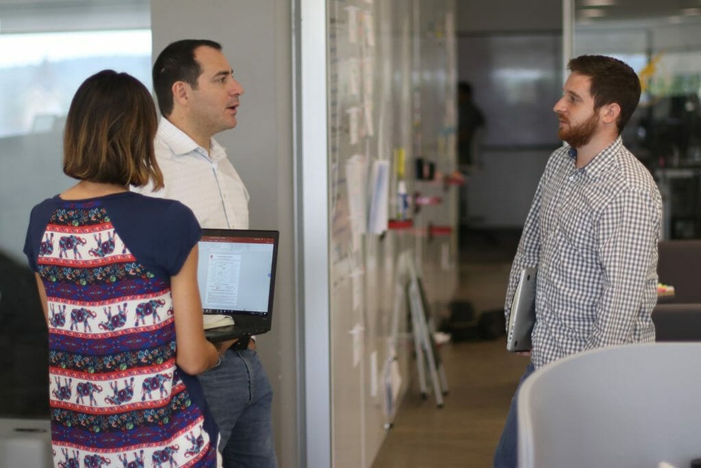 Coworkers discussing