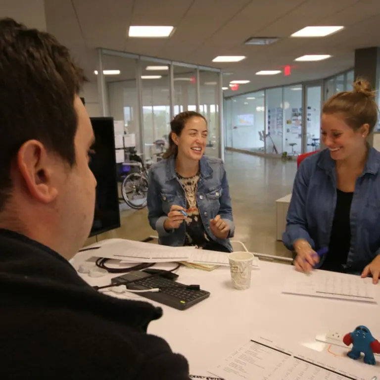 PI coworkers laughing