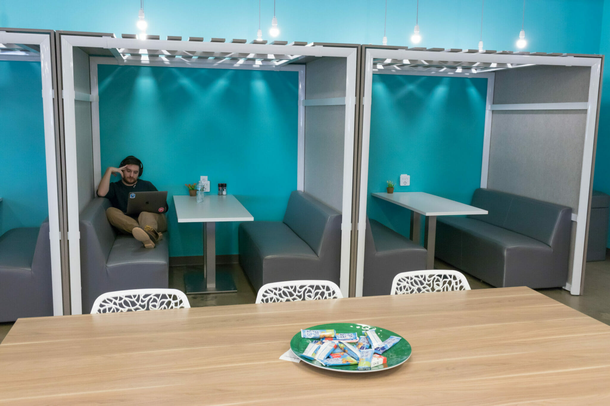 Managing millennials in the workplace means providing a variety of work stations to choose from.
