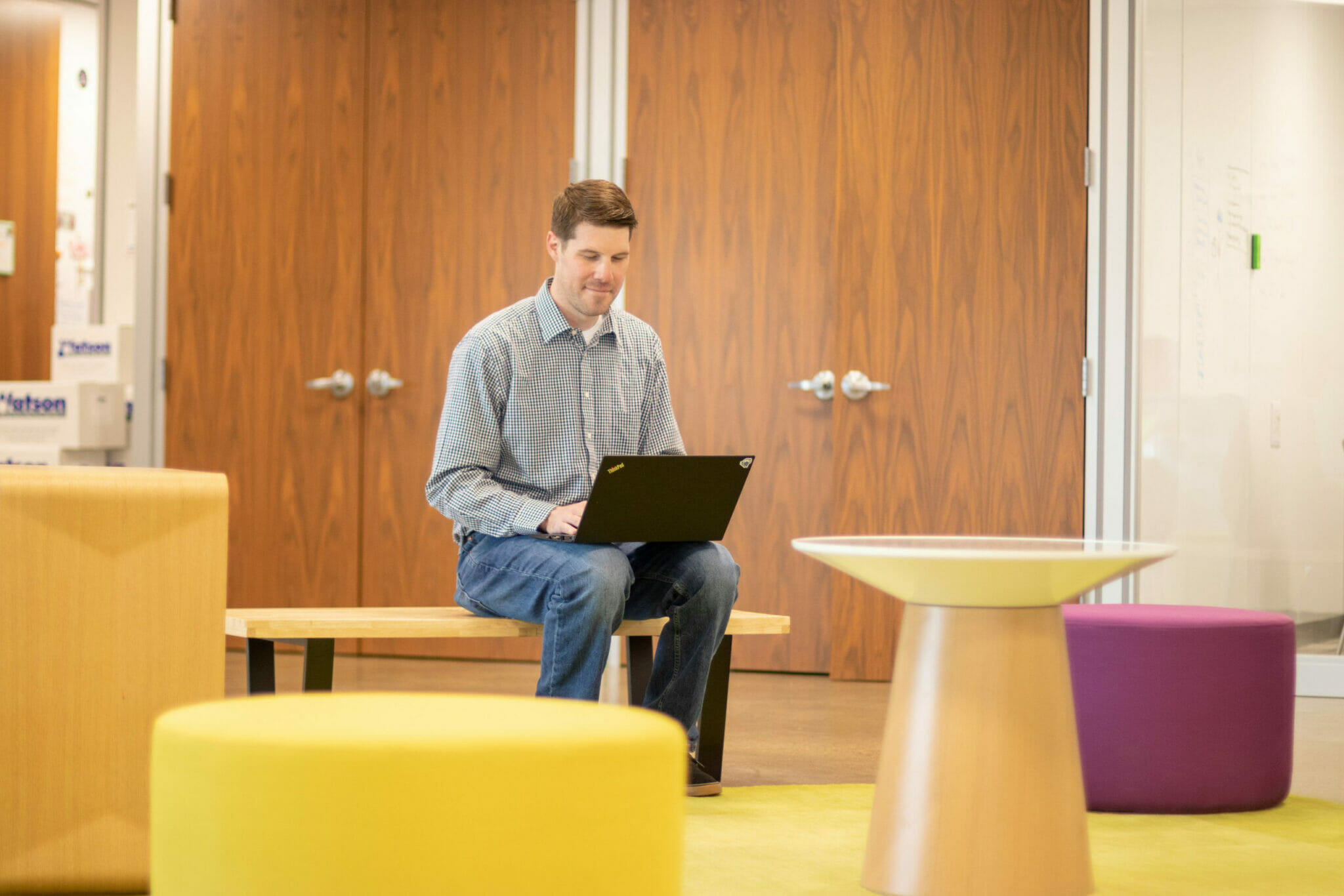 Disengaged employee in office on laptop