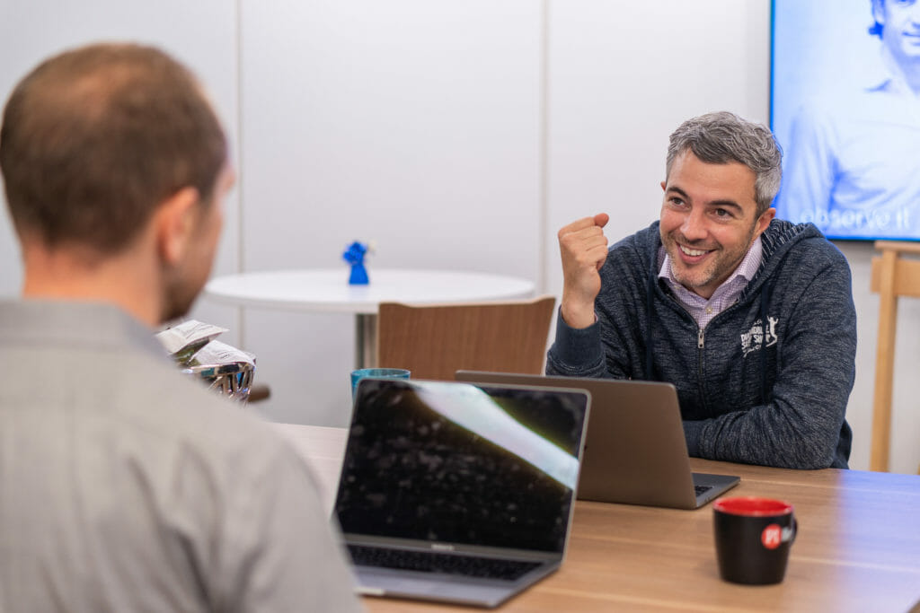 A recruiter interviews a candidate during the candidate selection process.