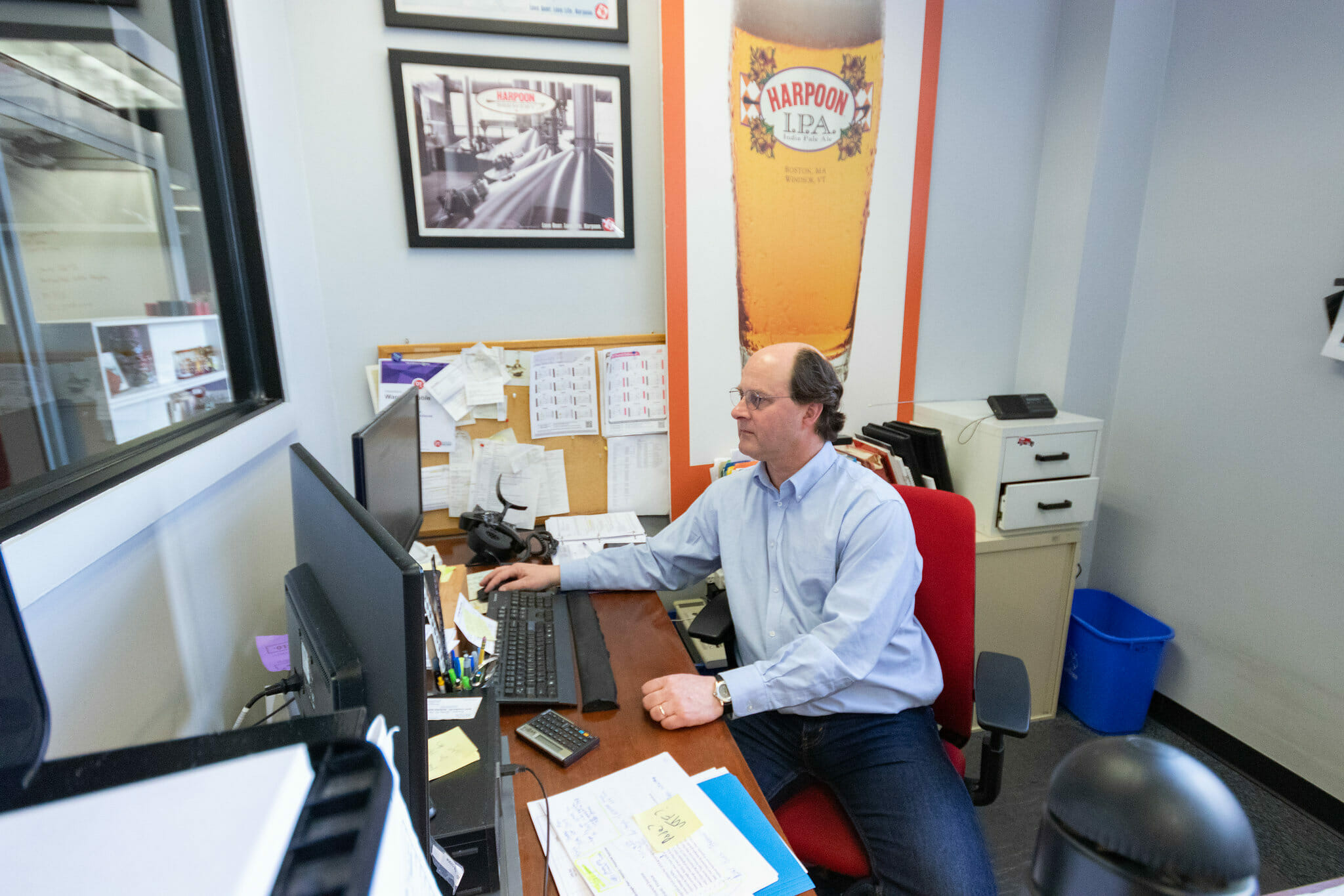 A manager sits at his desk