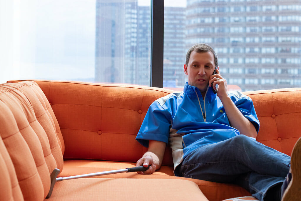 Employee on couch in workplace