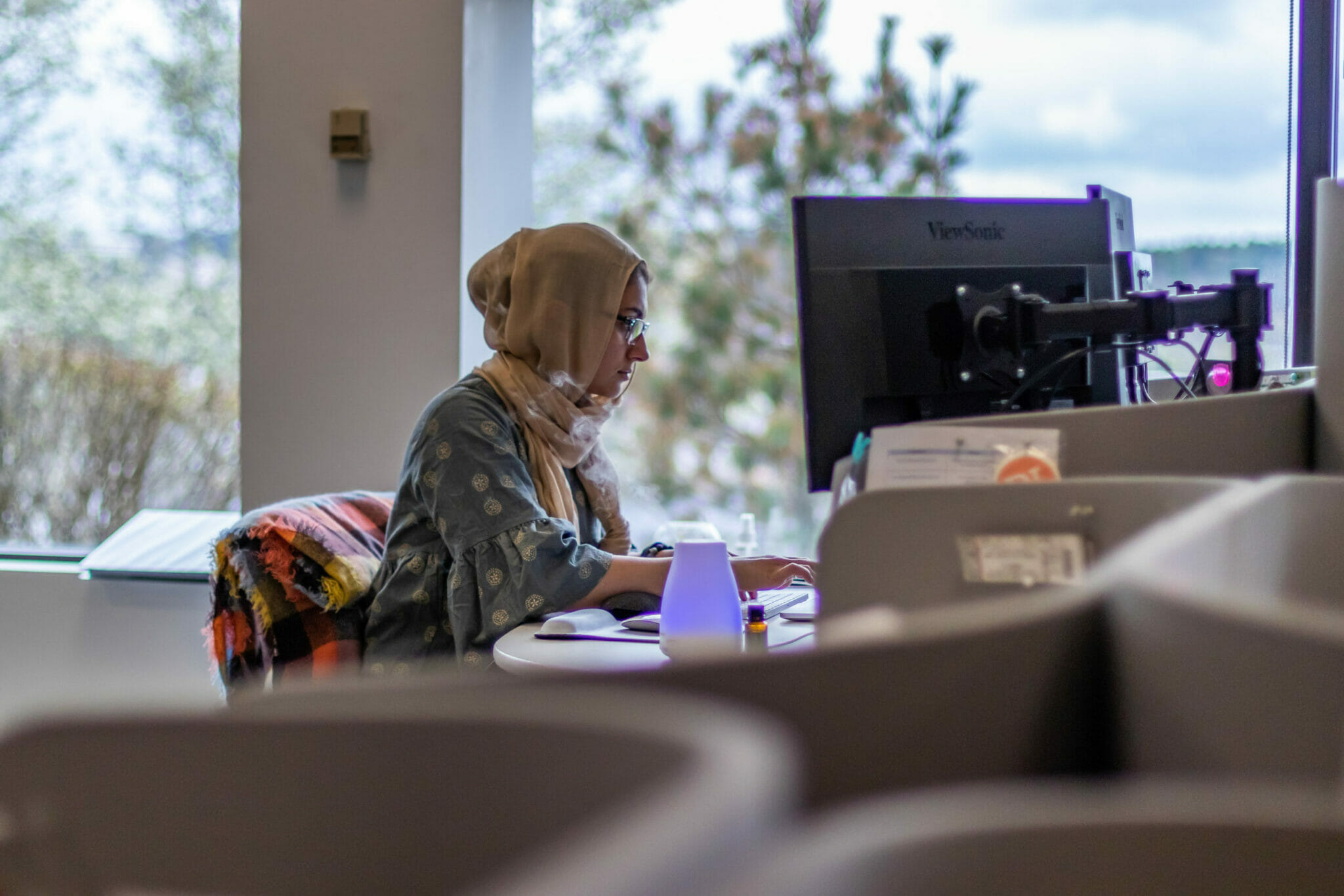 engaged employee works at computer