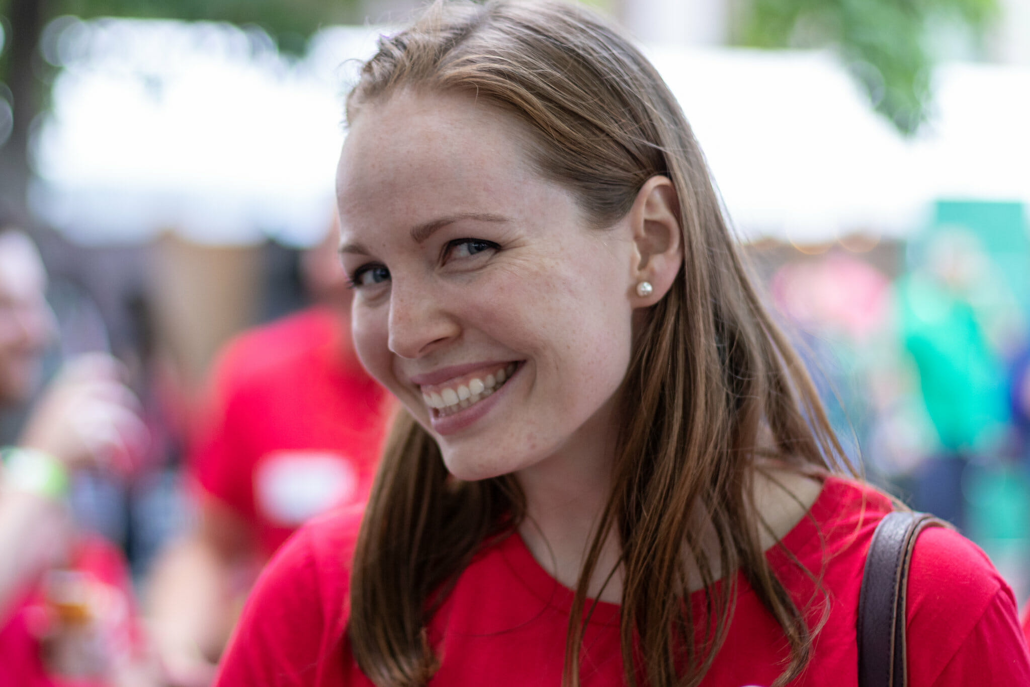 Amanda smiling outdoors
