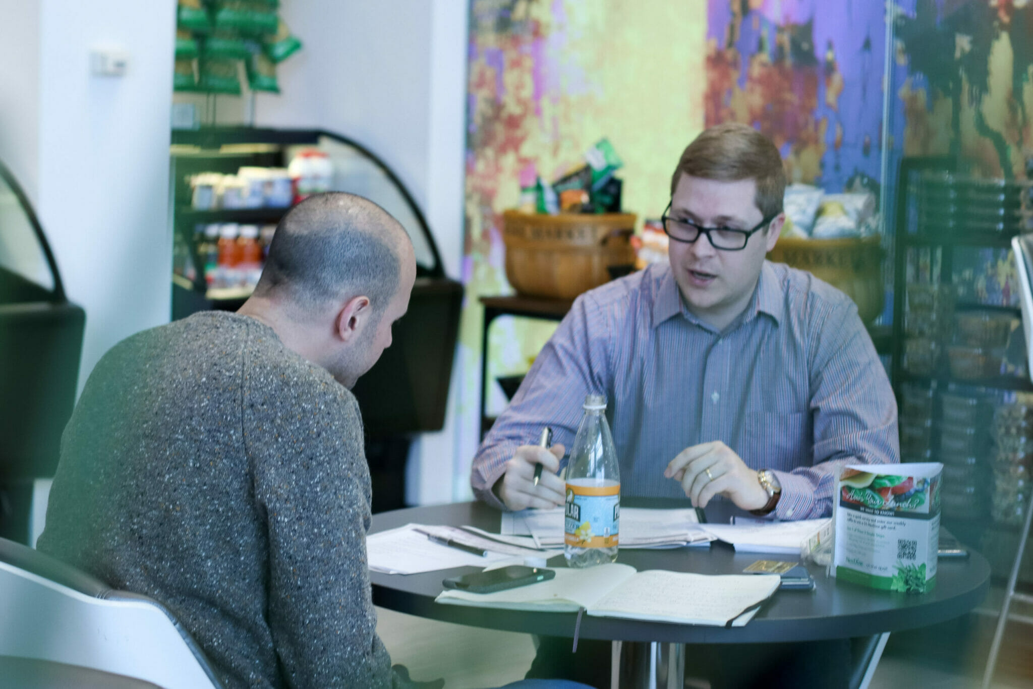 two employees talking seriously