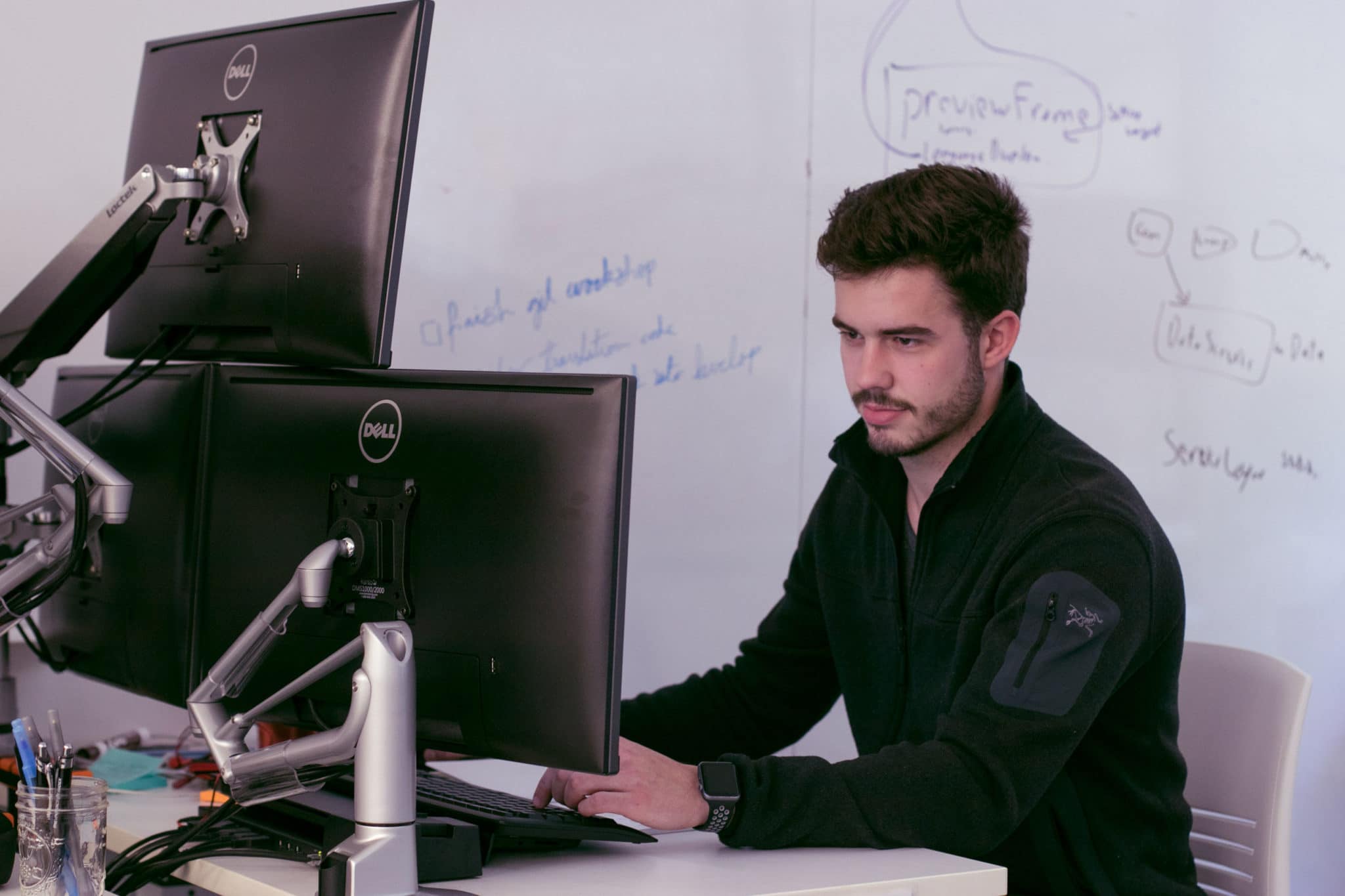 employee typing on computer