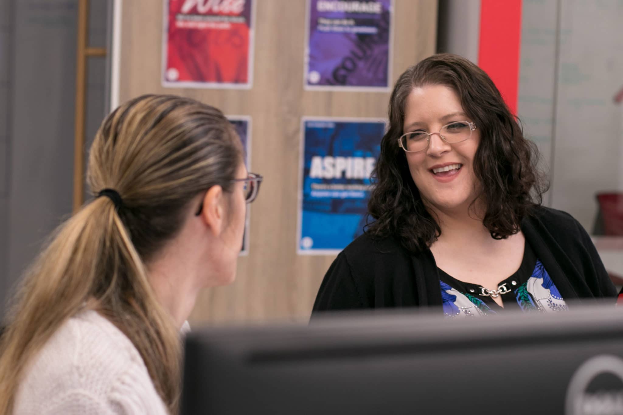 employees chatting in the office