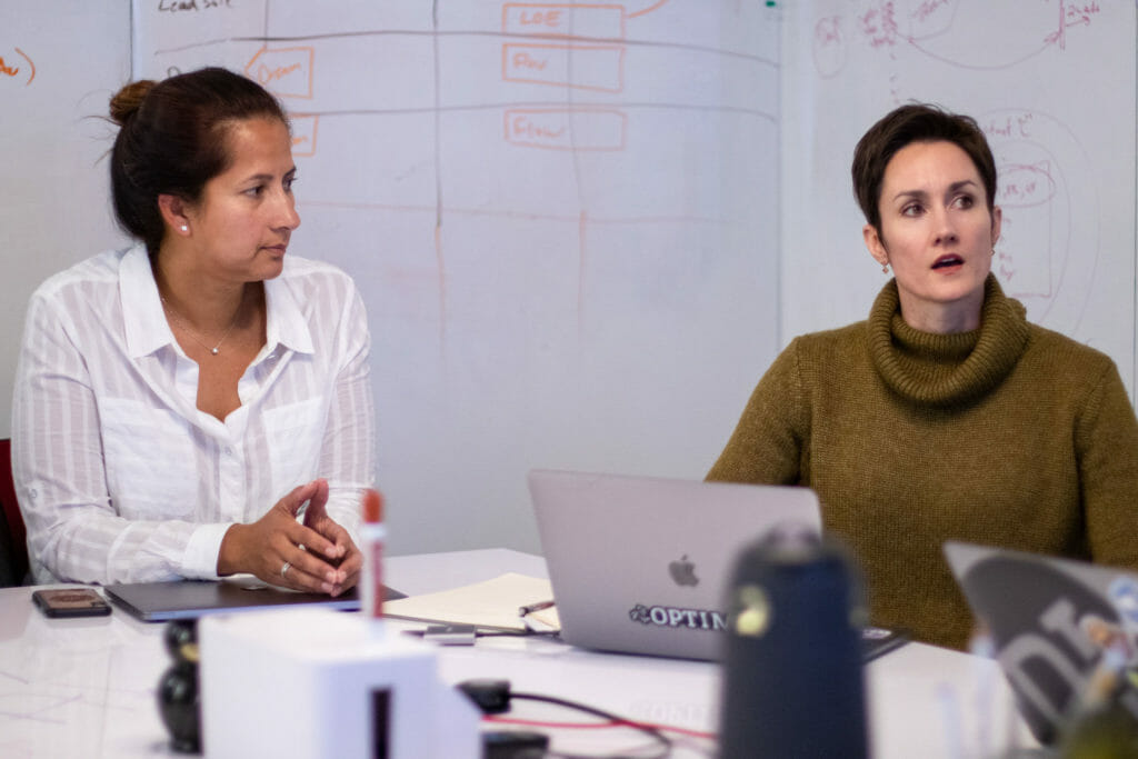 two executives discussing post-merger integration