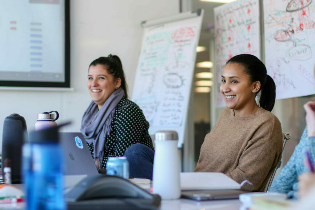 Two people sharing their employee expectations with each other.