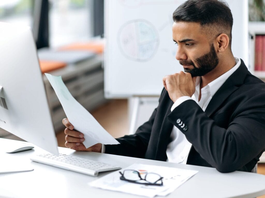 Focused manager reviewing data