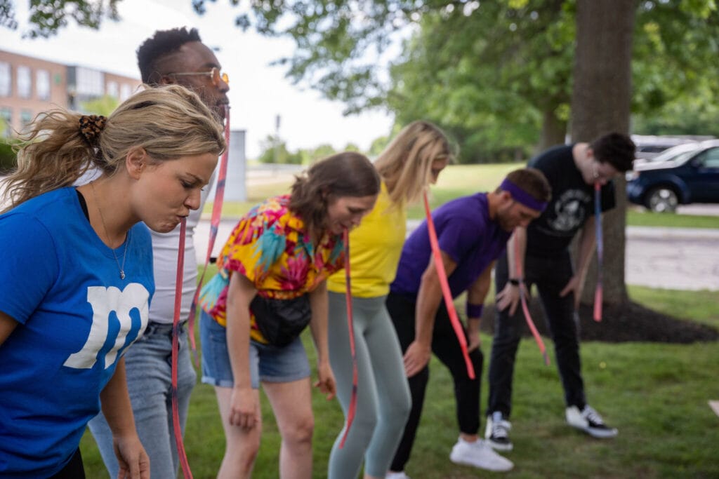 employees doing a team building exercise