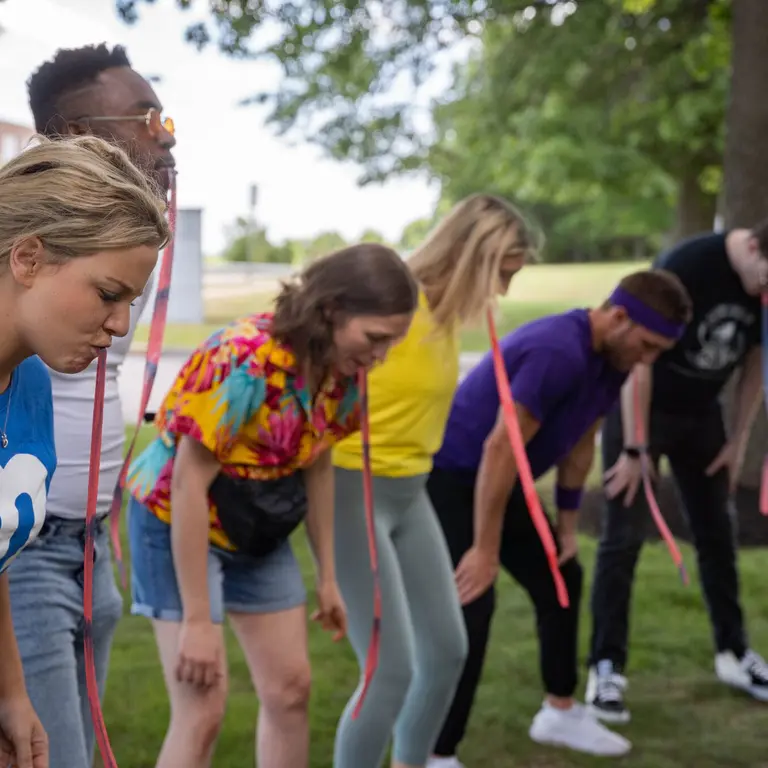 employees doing a team building exercise