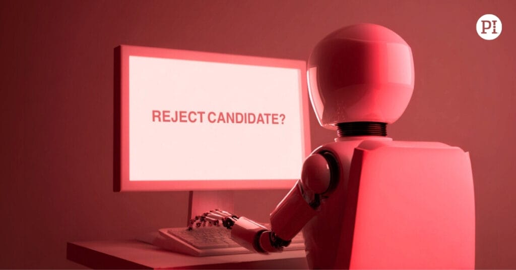 A robot in front of a computer with Reject Candidate on the screen.